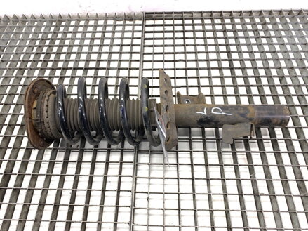 Tlumič levý přední S pružinou Volvo V70 III (135) 2007 - 2016 31212510