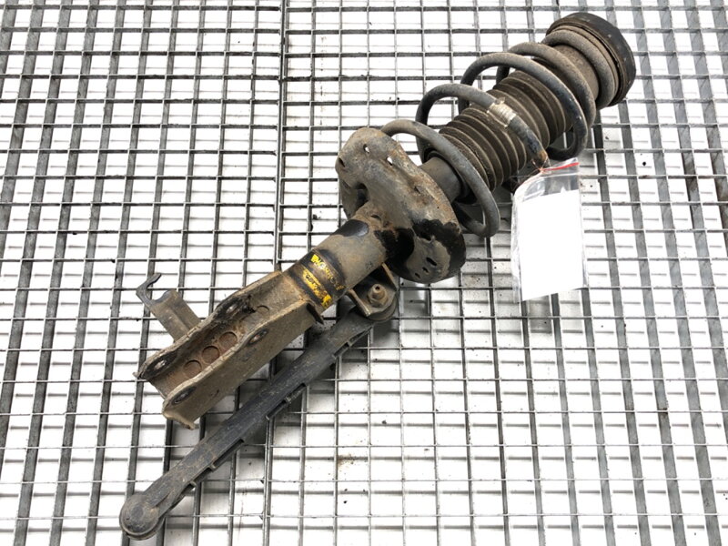 Tlumič levý přední S pružinou Opel Astra J (P10) 2009 - 2015