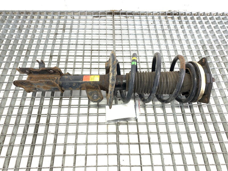 Tlumič levý přední S pružinou Nissan Qashqai / Qashqai + 2 I (J10, NJ10, JJ10E) 2006 - 2014