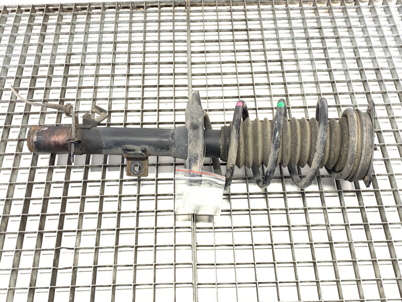 Tlumič levý přední S pružinou Renault Kadjar (HA_, HL_) 2015 - 2022