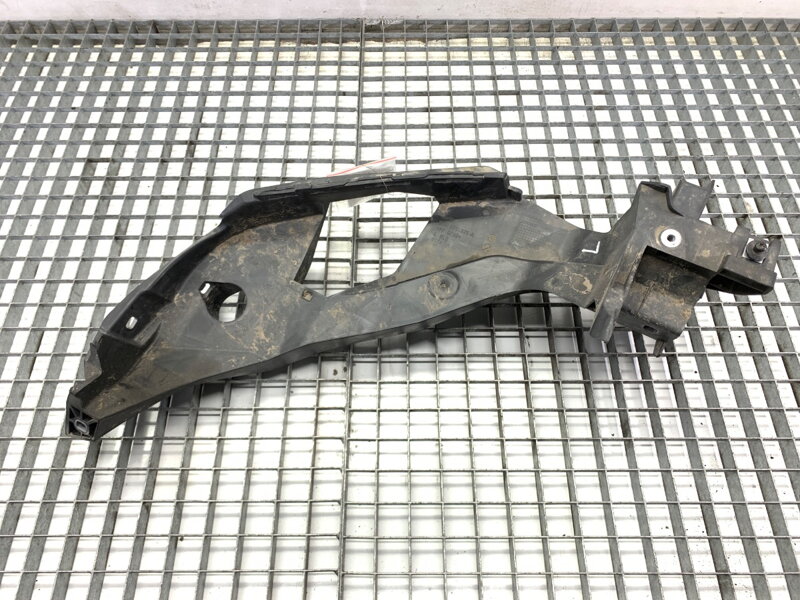 Držák světla levý Audi Q4 Sportback (F4N) 2021 - 2022 89A805325A